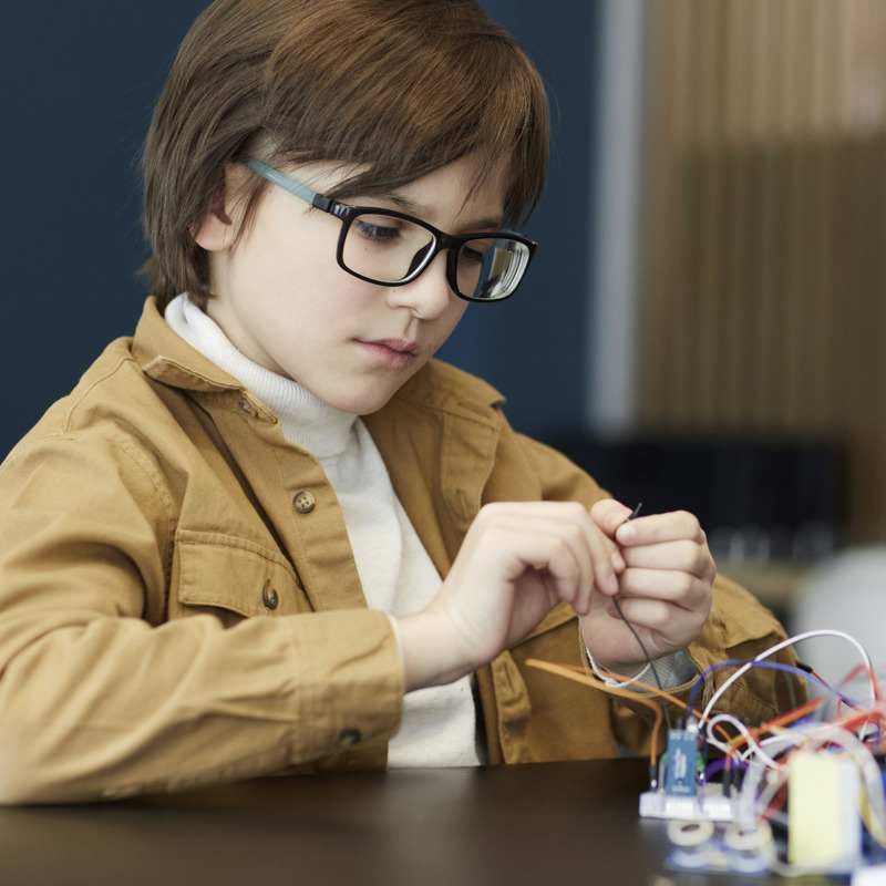 Child experimenting with circuitry