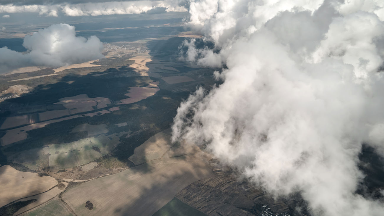 Clouds casting shadows on the ground